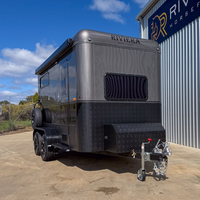 Front side view of the Riviera 2 Horse Angle Load Compact Camper horse float