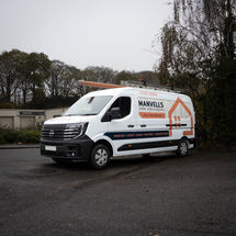 A white Nissan Interstar van with graphics applied by Goodwin Graphics