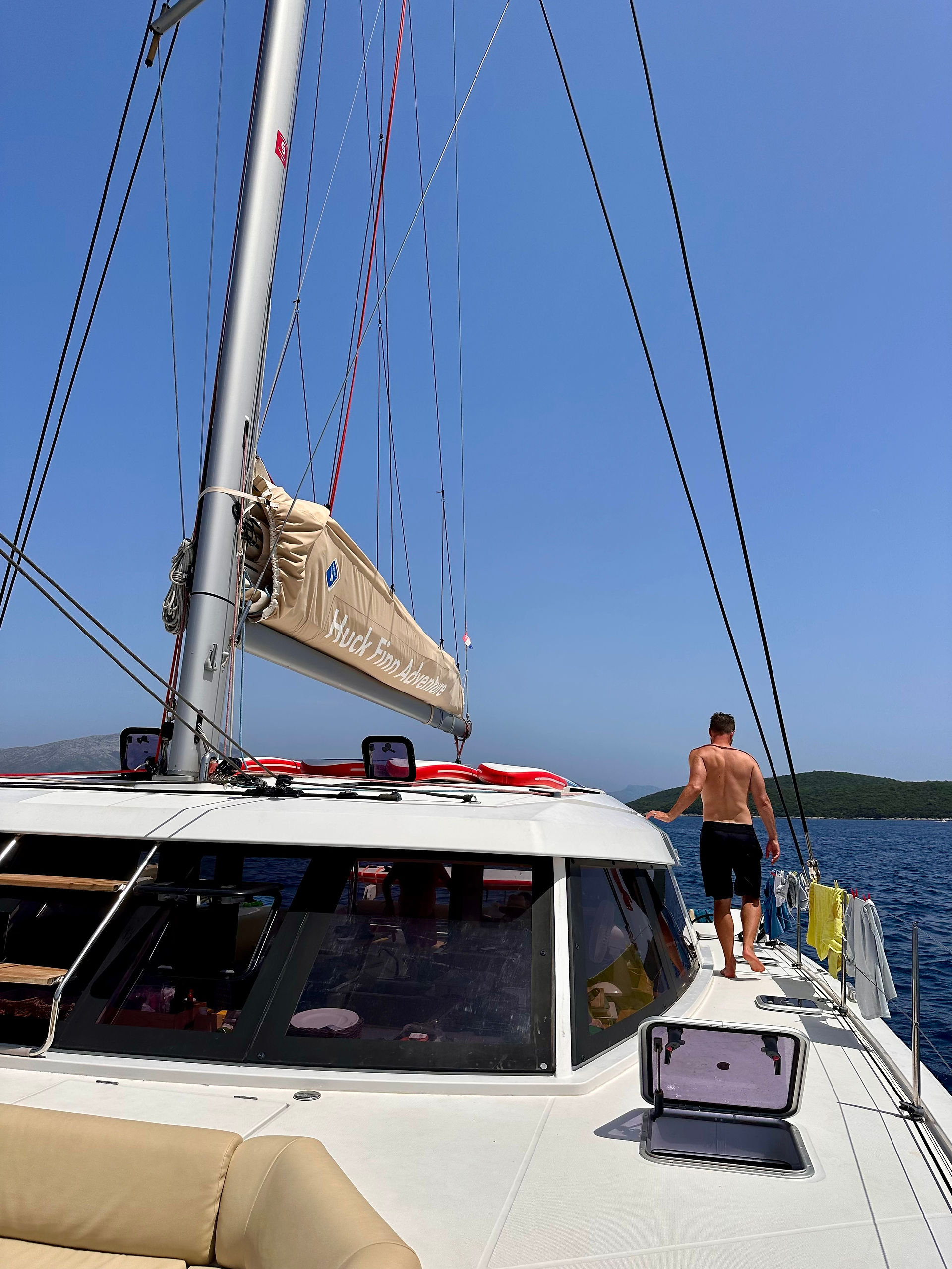 man walking on catamaran in croatia