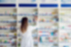 apothecary-worker-looking-medicines-pharmacy.jpg