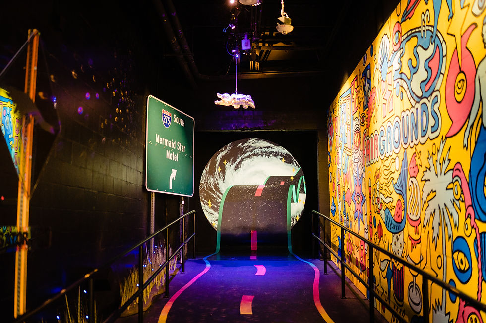 A cosmic hallway with a swirling portal, a Mermaid Star Motel road sign, and psychedelic wall art. Part of FloridaRAMA's immersive take on Florida mysteries.