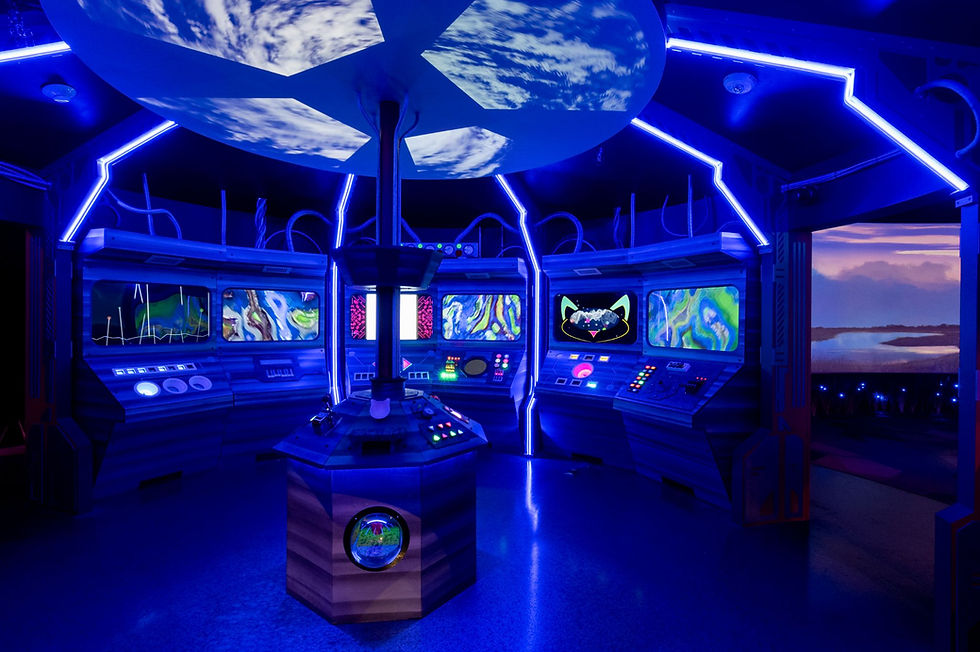 A neon-lit control room filled with sci-fi consoles and monitors, a nod to the extraterrestrial side of Florida myths and legends.