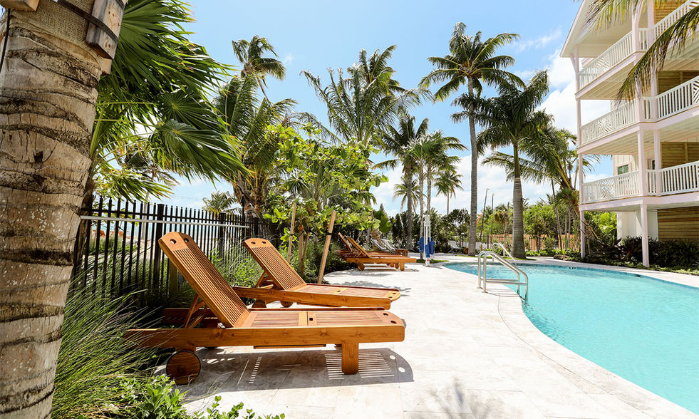 Lounge chairs by the adults only pool at a hotel in the Florida Keys.