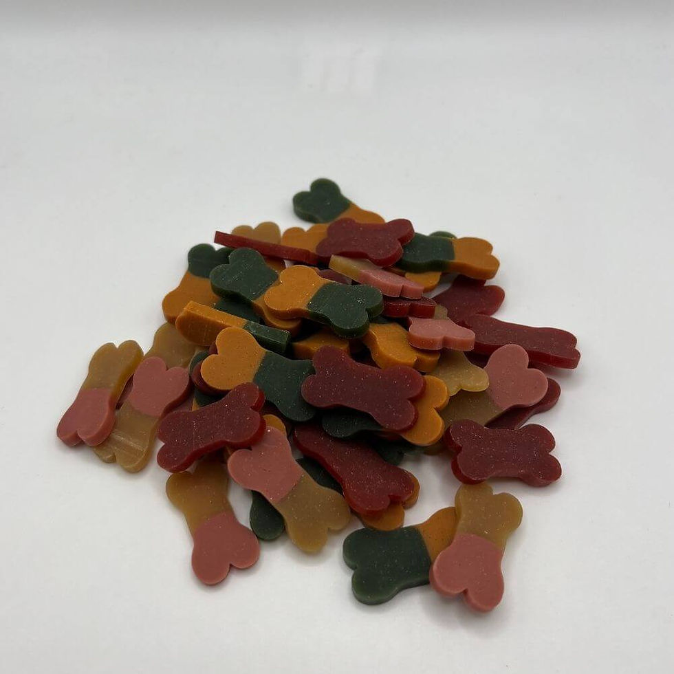 Thumbnail: Close-up of small dark vegan dog treats – bite-sized training snacks