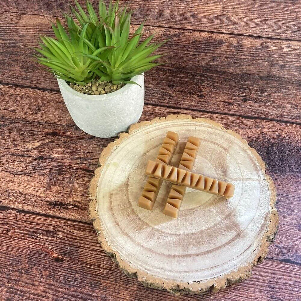 Thumbnail: Whole peanut butter chew bar displayed on wooden slice board with greenery