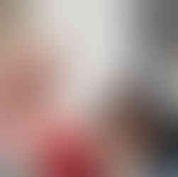 Captain Kindman makes a heart with Jelene