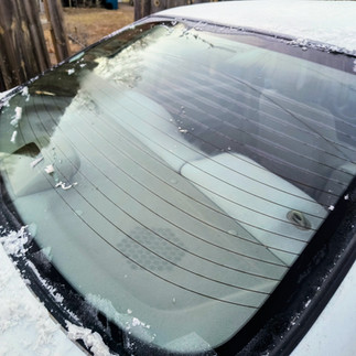 Back windshield scraped