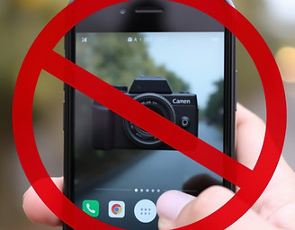 no cameras - circle red with line crossing out camera or cell phone.jpg