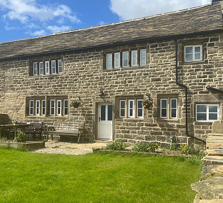 Moorlands Farmhouse exterior, garden and patio with table chairs and garden bench