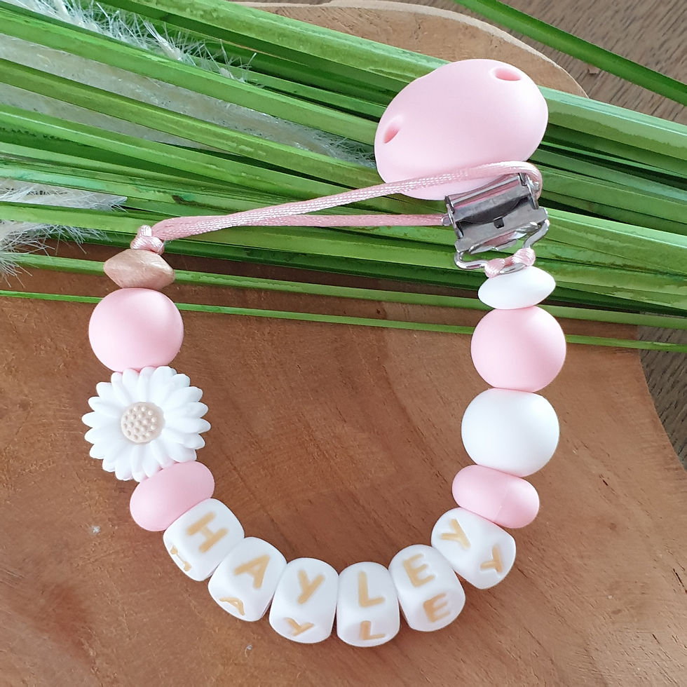 speenkoord in het wit roze met een klein daisy bloemetje