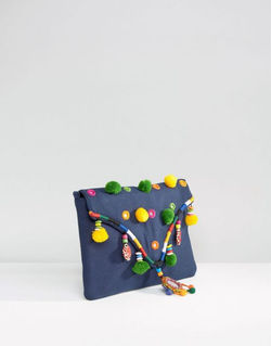 Clutch With Pom Detail