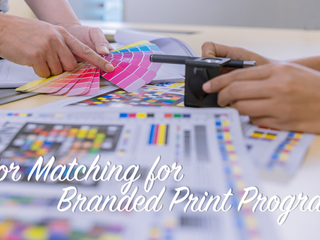 Two hands color matching with swatches and print samples. Text reads "Color Matching for Branded Print Programs." Bright colors present.