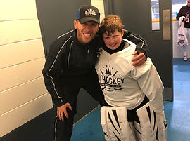 kl hockey coach and goalie face grimace.jpg