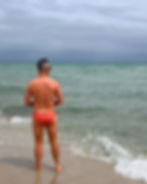 Ribbed Cheeky Swim Brief in Coral