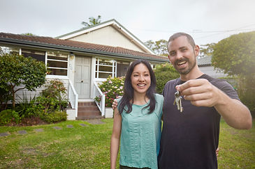 Happy house buyersWeb.jpg