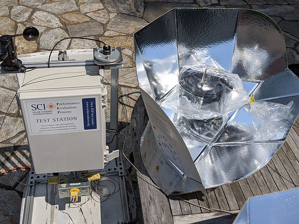 SCI staff performs Performance Evaluation Process (PEP) tests to measure the efficiency of solar cookers. Photo credit: SCI Program and Science Director Alan Bigelow, Ph.D.