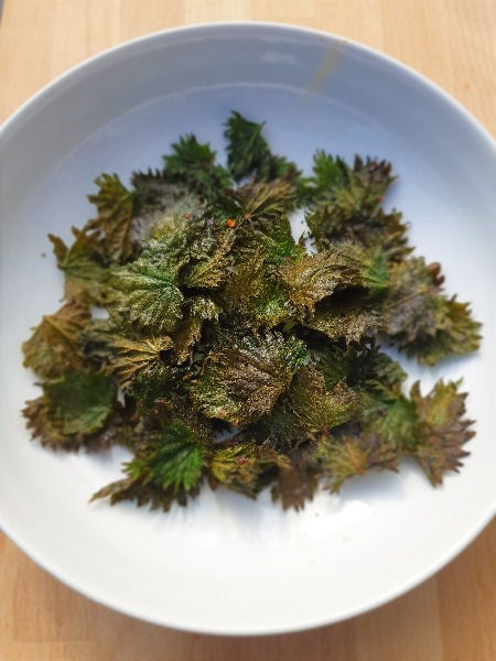 Nettle crisps on a plate