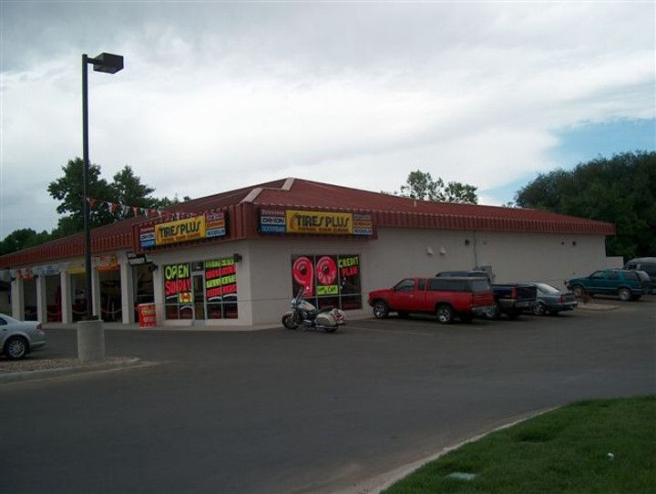 Tire Town store exterior with sale signs