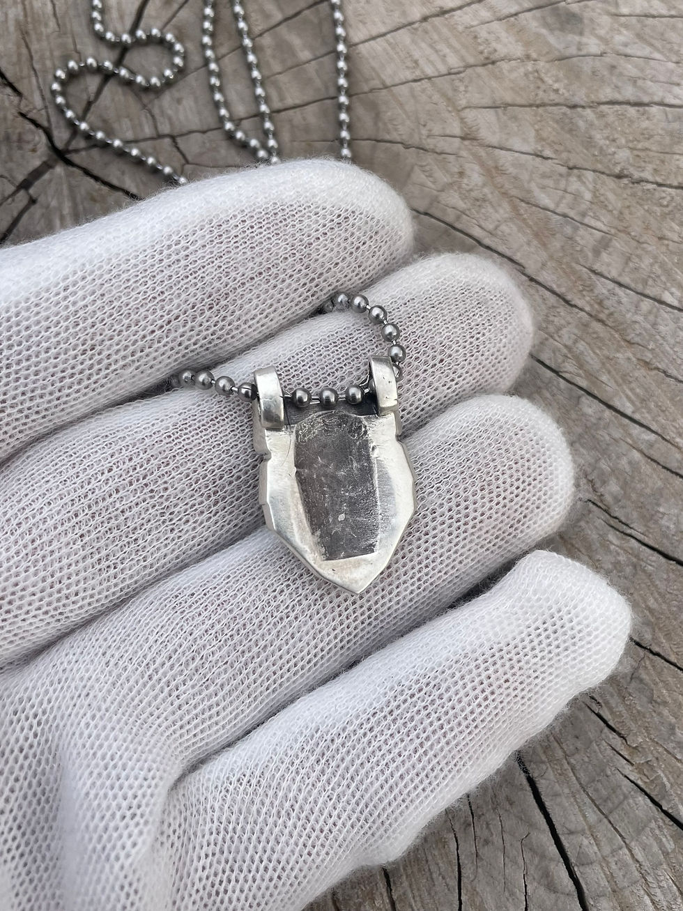 Thumbnail: geometric wolf pendant