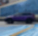 Purple SUV parked by a blue icy mural and wavy painted ground.