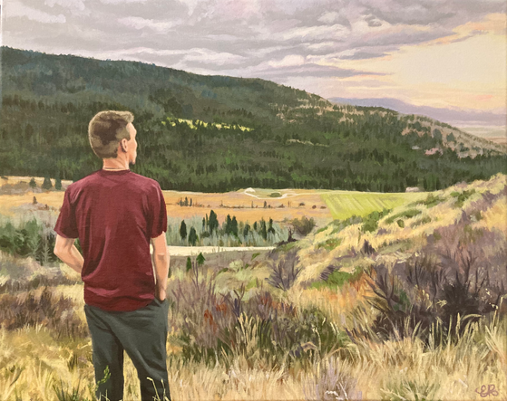 A custom painting by Emmelyn Redd of a man in a dark red shirt standing and looking over the valley and at the sunrise in the distance.
