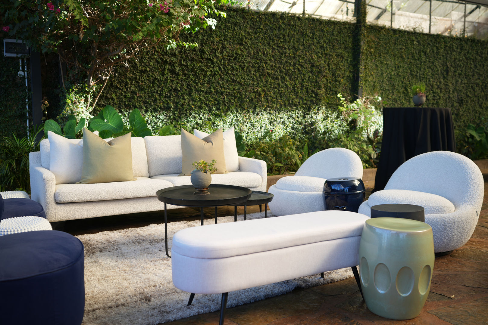 Simplistic lounging pockets in white and light blues, creating comfortability and luxury. A winning combination!