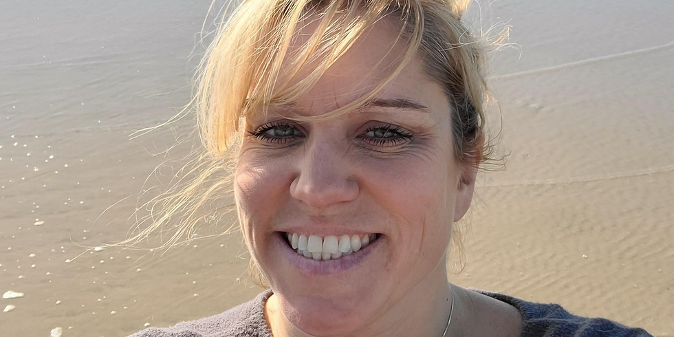 Micaela Hicks, agent with Vox Inc. Blonde woman in casual outdoor beach setting