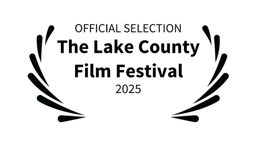 Laurel wreath graphic with text: "Official Selection, The Lake County Film Festival 2025." Black text on white background.