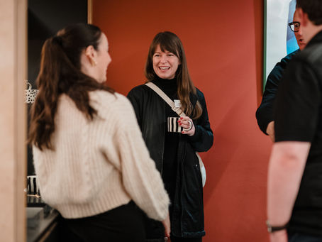 Woman networking at business networking breakfast