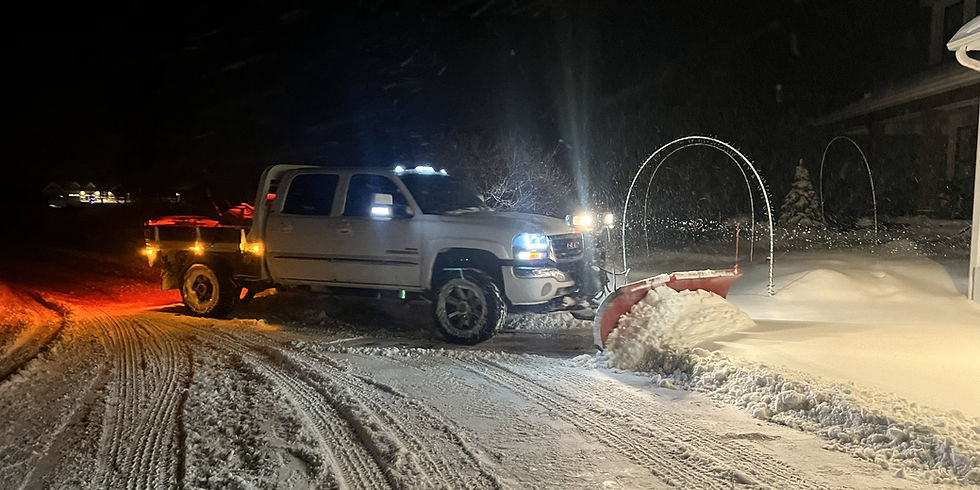 Snow plowing residential driveway in Hudson, WI