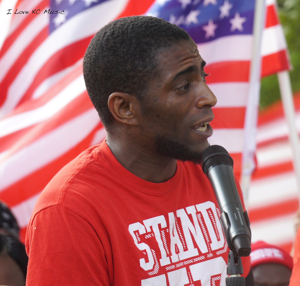 Terrance Speaking at a Labor Day March