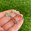 Thumbnail: Natural Red Coral Cross-Top Stud Earrings Handmade by Navajo Geneva Apachito