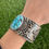 Thumbnail: Kingman Turq Thunderbird Applique Cuff Handmade by NavajoTsosie White