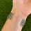Thumbnail: Kingman Turq S Heart Stampwork Stacker Cuff Handmade by Navajo Andy Cadman