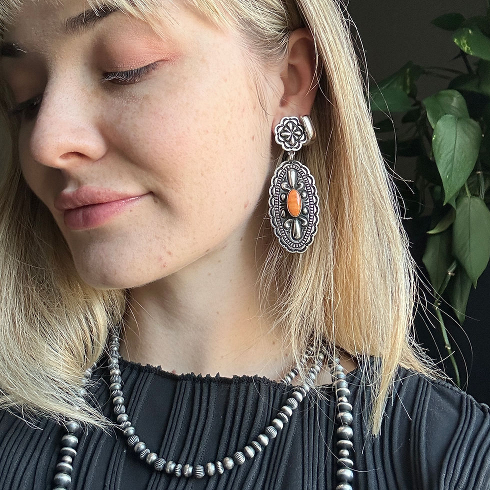 Thumbnail: Orange Spiny Oval Medallion Repoussé Stud Earrings Handmade Navajo Tsosie White