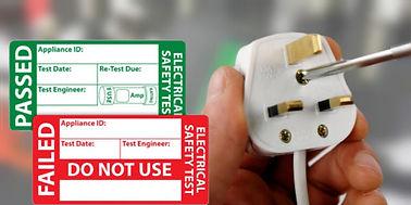 Plug with PAT test stickers showing compliance