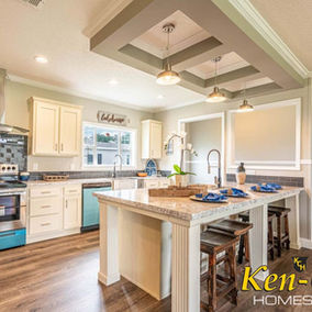 Modern kitchen with white cabinets and island; Ken-Co Homes Inc.
