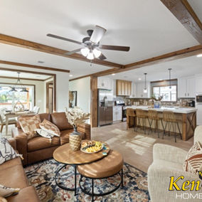 Interior view of a living room with KenCo Homes Inc. visible.