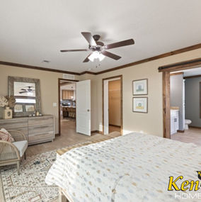 Bedroom interior with light fixtures, doors, and Ken-Co Homes visible in image.