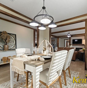 Dining room with table and chairs. Ken-Co Homes, decorative lighting, and decor.