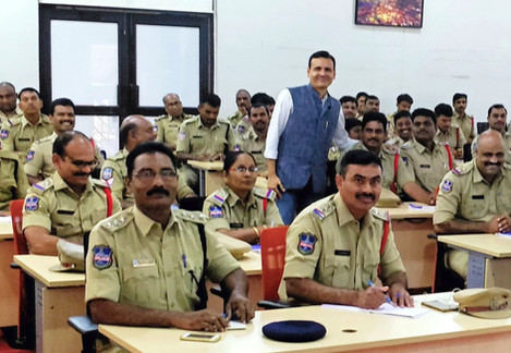 Dr. Vivek Modi with police officers in training