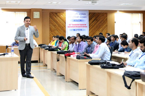 Dr. Vivek Modi lecturing professionals