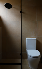 Terracotta tiled bathroom Lyons.png