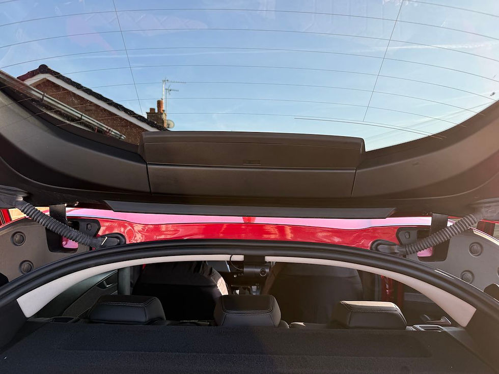 High angle view of Peugeot 408 interior showing dashcam wiring neatly tucked along the trim