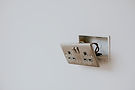electrician installing wall socket uk.jpg