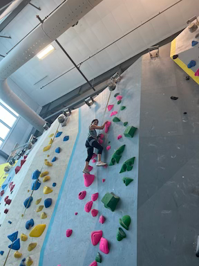 Woman at rock climbing gym