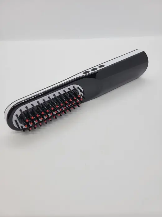 Thumbnail: cordless heated beard brush view from different angle