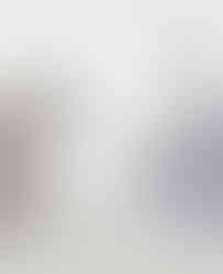 A geometric pendant necklace with a simulated pearl, crafted in gold-plated stainless steel.