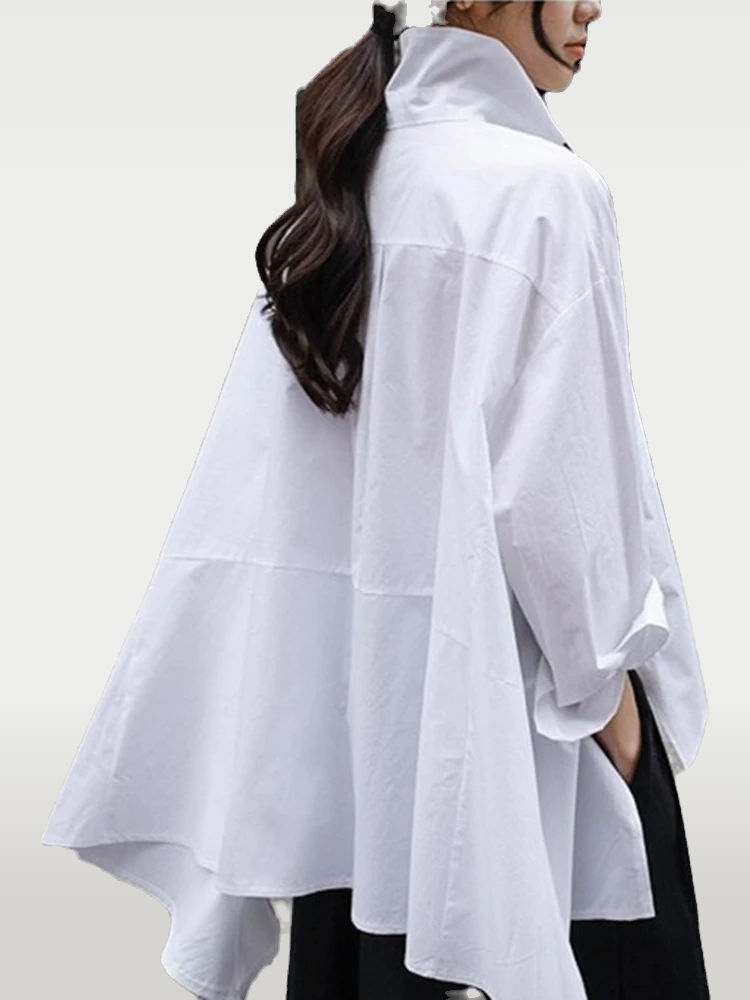 Black casual shirt by Cusuti. Loose fit, midweight synthetic fiber blend, turn-down collar, long sleeves. pen_spark