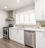 Grey and white kitchen designed by Casa Marcela in Hamilton, Ontario